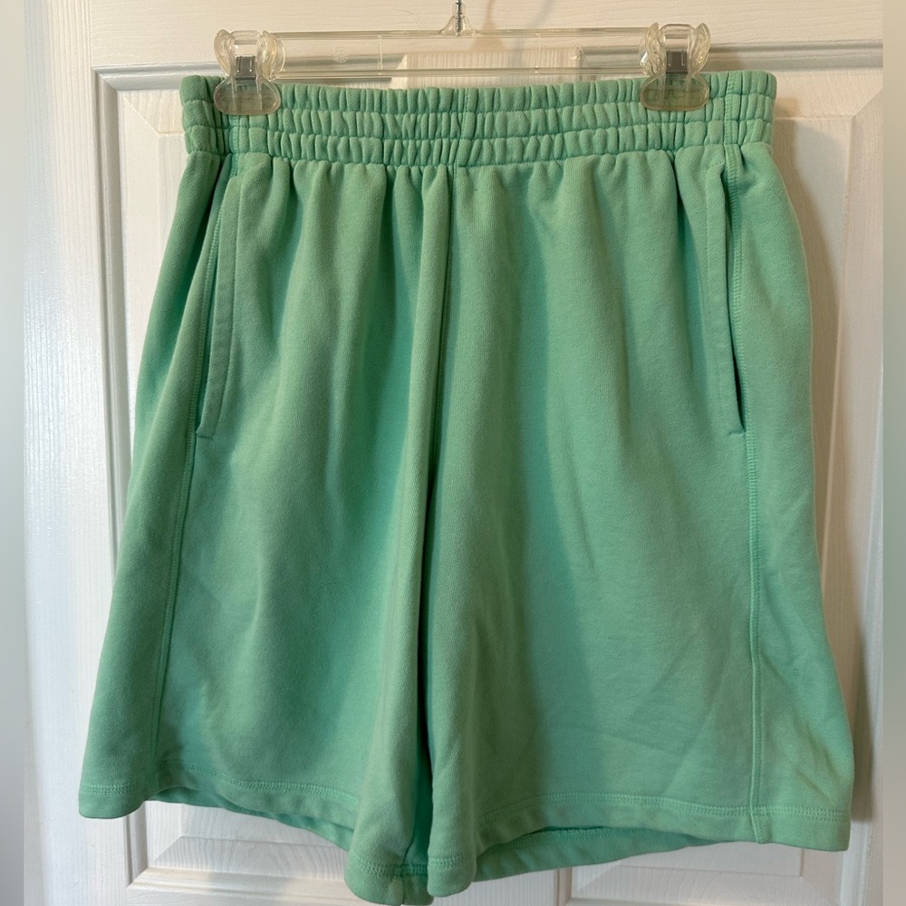 Men’s Adidas workout shorts. Light green. Size M.